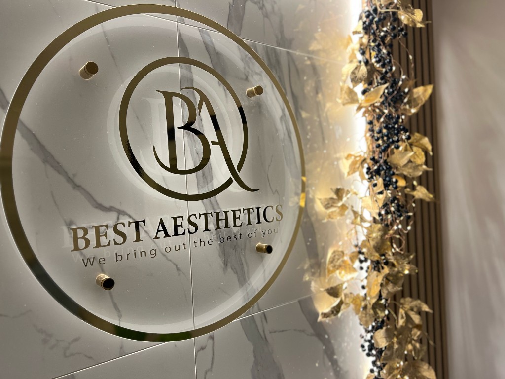 Backlit Best Aesthetics circular sign on marble at the Appleford-on-Thames premises